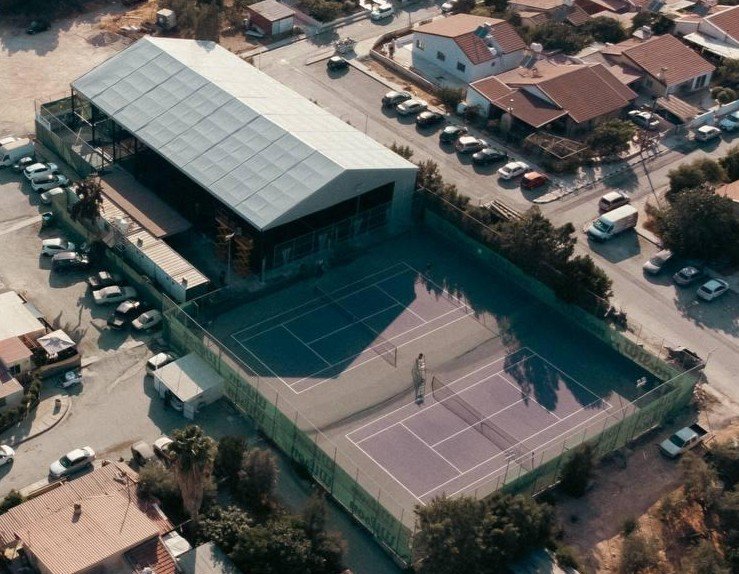 Aerial view of SMASH Padel & Tennis Academy's covered courts